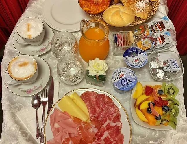 Residenza La Loggia Couette-café 4*